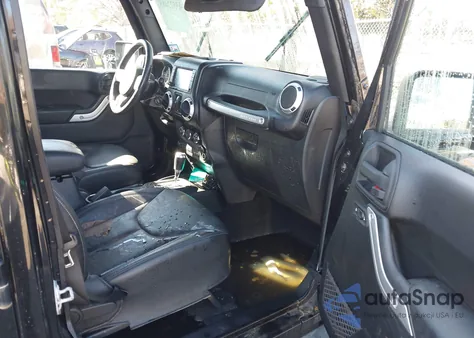 2015 Jeep Wrangler Unlimited Sahara из США, поврежденный, VIN 1C4HJWEG0FL695130